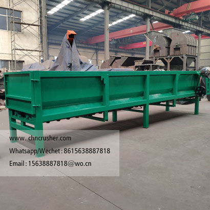 Trough-type wood debarking machine