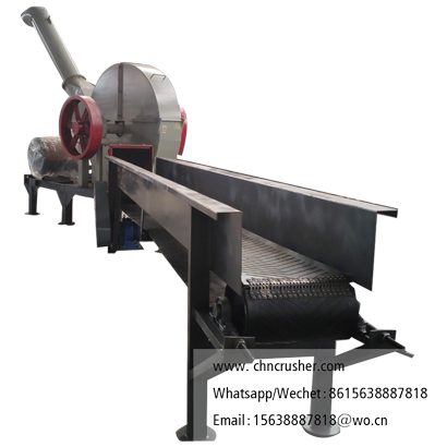 Belt conveyor fed wood chipper