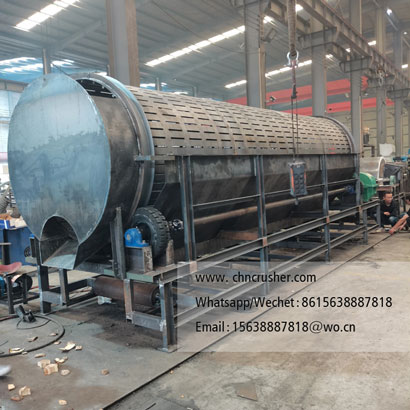 Rotary drum wood debarking machine