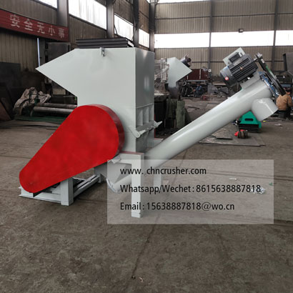 Spiral discharge woven bag shredder