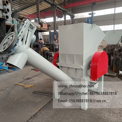 Spiral discharge woven bag shredder