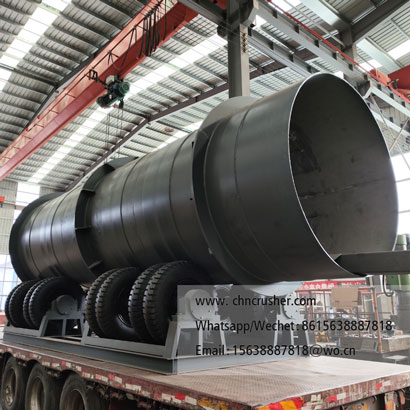 Rotary drum wood debarking machine