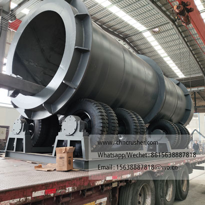 Rotary drum wood debarking machine