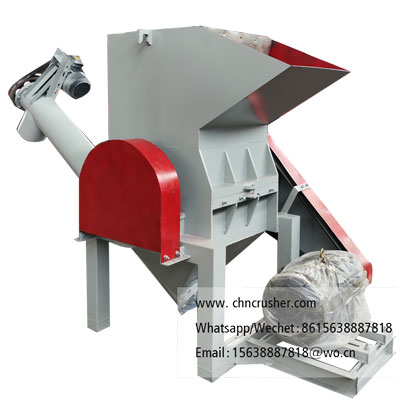 Spiral discharge woven bag shredder
